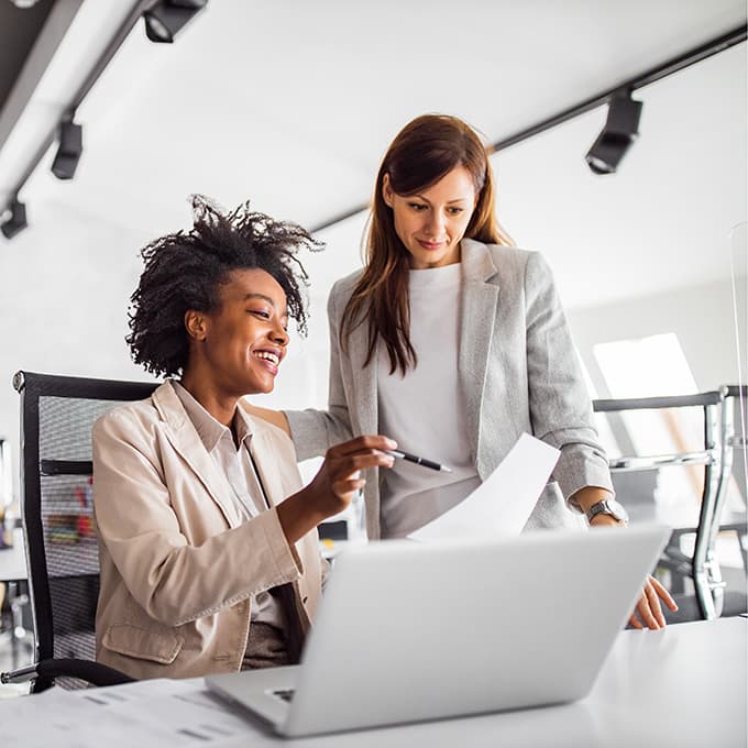 Small business owners reviewing their finances