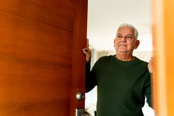 Person at their front door
